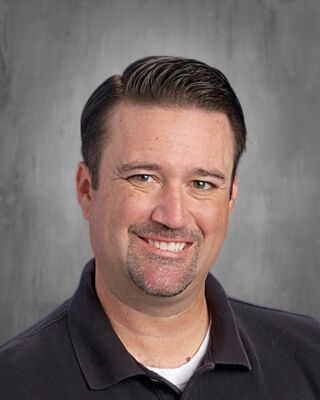 Photo of Tim Henry Photo of Tim Henry