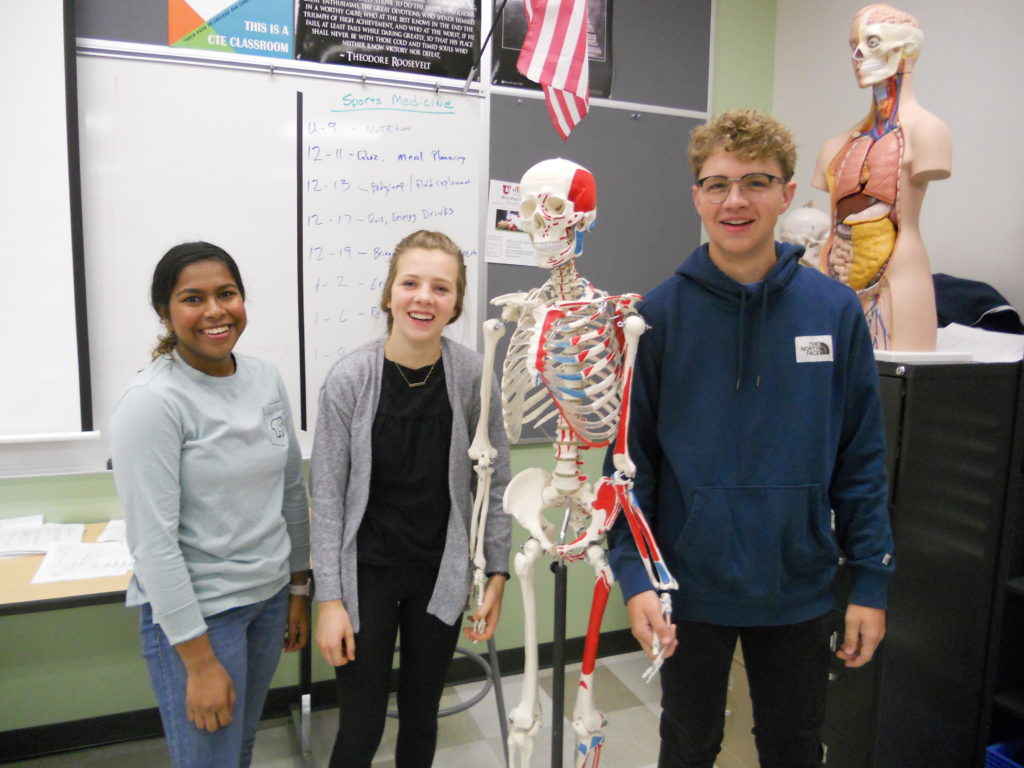 Picture of students with skeleton