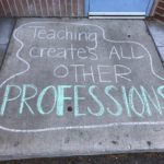 Teaching creates all other professions written in chalk on sidewalk
