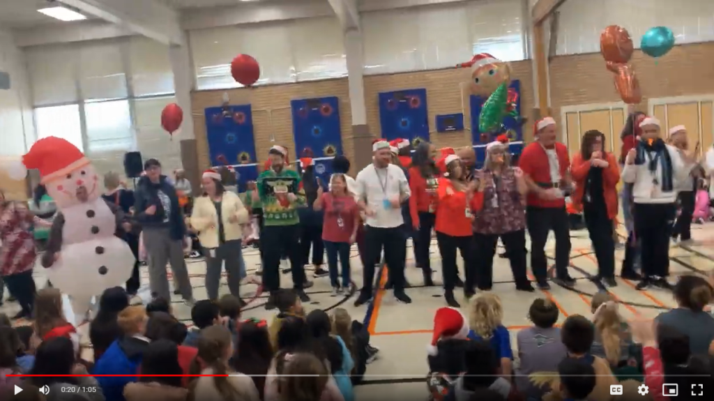 Video of staff singing "Have yourself a merry little christmas"